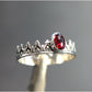 Alienor sterling silver oval garnet crown ring